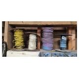 3 SPOOLS OF CABLE AND SPOOL OF ROPE