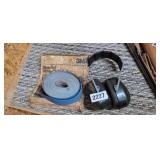 EAR MUFFS AND BLUE GRIT SANDING CLOTH