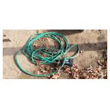 HOSE WITH PUMP ATTACHED