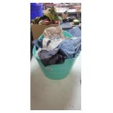 TUB FULL OF CLOTHING