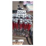 RED HANDLED SILVERWARE WITH RACK