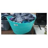 TUB FULL OF CLOTHING