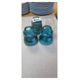 3 BLUE AND 1 PYREX VINTAGE INSULATORS