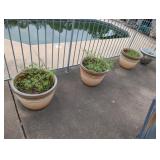 4 LARGE PLASTIC PLANTERS
