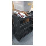 PLASTIC RACK WITH CDS AND DVDS