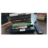DVD PLAYER WITH REMOTE AND MOVIES