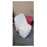 TOTE OF ABOUT 150 WHITE CHAIR COVERS