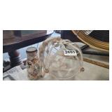 HANGING PLANT HOLDER AND BOTTLE OF SHELLS