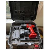 BLACK AND DECKER DRILL AND BATTERY IN CASE