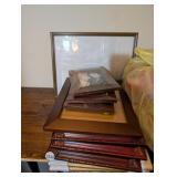 STACK OF PICTURE FRAMES
