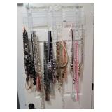 DOOR HANGING JEWELRY RACK FULL OF NECKLACES