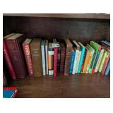 SHELF FULL OF MOSTLY CHRISTIAN BOOKS