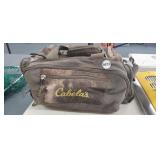 CABELAS BAG FULL OF FISHING REELS, TACKLE, ETC