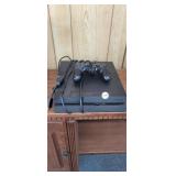 PLAYSTATION 4 WITH POWER CORD AND CONTROLLER