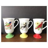 Colorful vintage bird mug trio