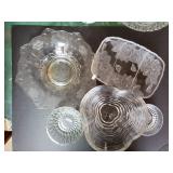 Lot of clear serving bowls and trays