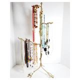 Beaded jewlery lot on display tree