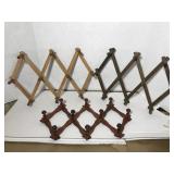 Three folding wall racks