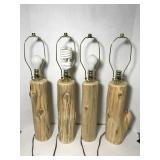 Set of four rustic log lamps