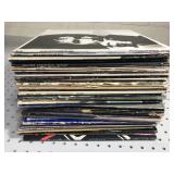 Stack of classic rock & pop music records