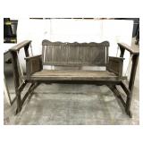 Rustic wood porch swing