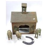 Cast iron farm house with animals
