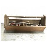Old wooden tool caddy with tools