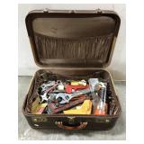 Vintage suitcase filled with tools