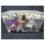 Clear plastic sewing case with thread
