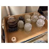 Clear Glass Insulators And One Ceramic Insulator