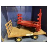 Red Wooden Wagon And Metal Wagon