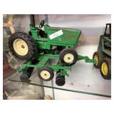Green Metal Tractor And Disc