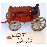 Red Cast Iron Toy Tractor with Driver