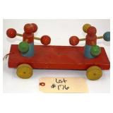 Wooden Pull Toy with Rotating Figures