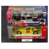 Two 1:24 Scale Diecast Model Cars