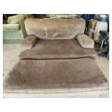 Brown chair and half and ottoman
