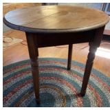 Round wooden side table