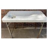 Folding plastic top table