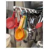 Large assortment of kitchen utensils