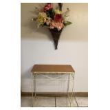 Small side table and floral decor