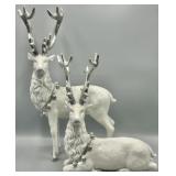 Resting and Standing White & Silver Deer