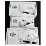 3 International 1/34 scale diecast trucks