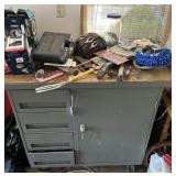 Metal rolling work table and contents