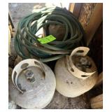 Garden hose, propane tanks, and wood box of misc