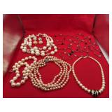 Assorted necklaces and more