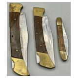 Assortment of Wood & Brass Handle Pocket Knives