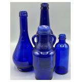 (4) Cobalt Blue Vintage Bottles