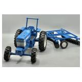 Ertl 1/16 Blue Ford Tractor 7710 w/ Disc Plow F.I.