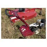 White outdoor 18' rear tine tiller