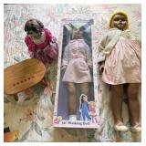 3 dolls and wooden stool